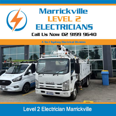 Level 2 electricians van and truck parked outside office in Marrickville